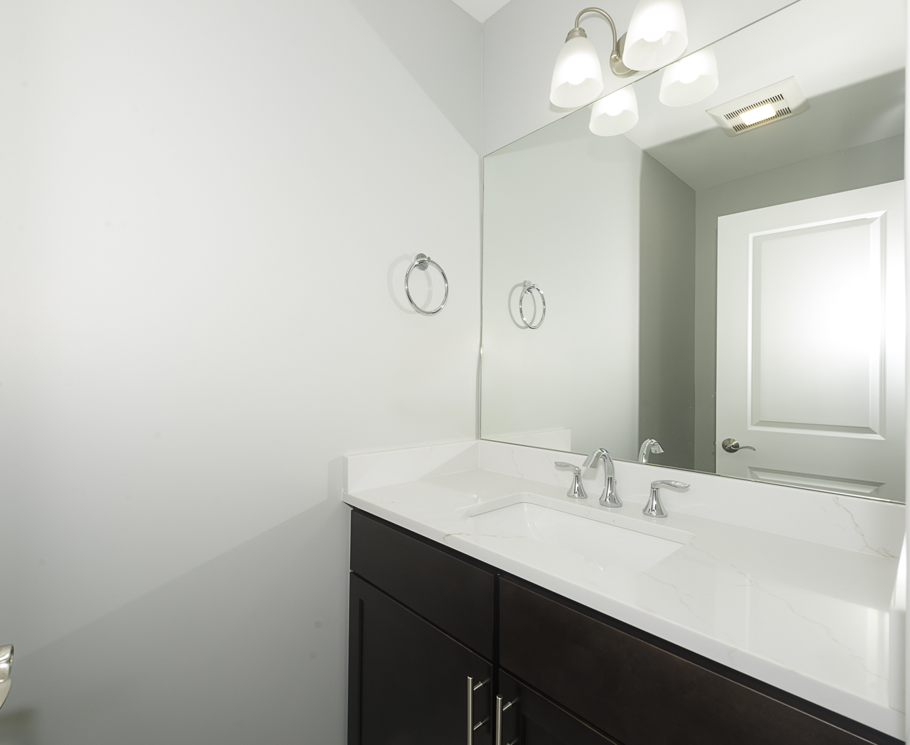 520 North Western Avenue, Unit 4B Chicago, IL 60612 - Photo 19 of 35 a bathroom with a sink and a mirror