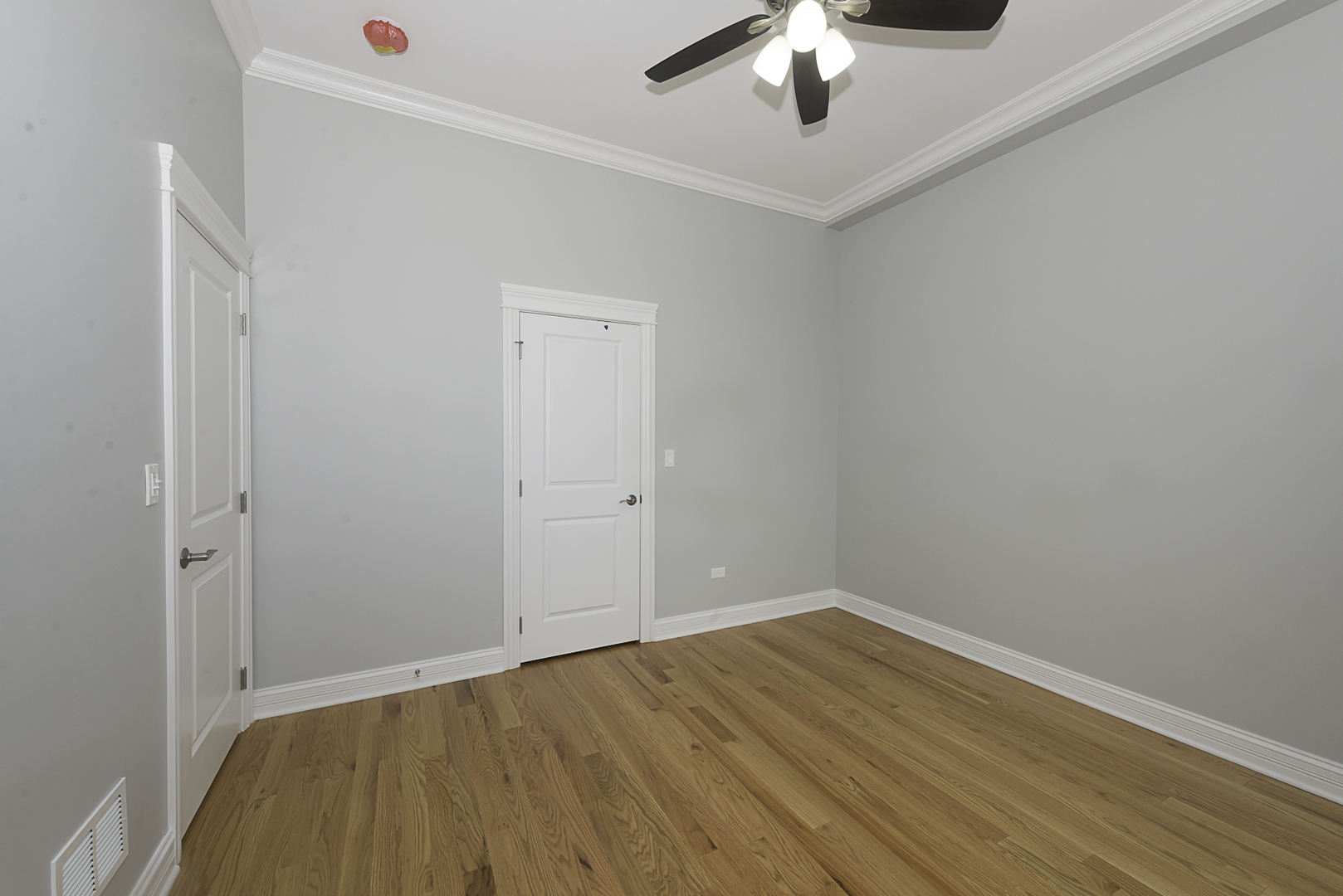 520 North Western Avenue, Unit 4B Chicago, IL 60612 - Photo 23 of 35 wooden floor in an empty room