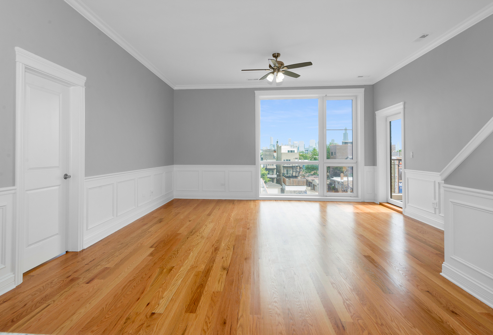 520 North Western Avenue, Unit 4B Chicago, IL 60612 - Photo 26 of 35 a view of an empty room with wooden floor and a window