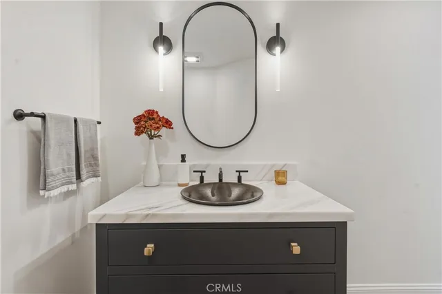 a spacious bedroom with a large bed and a large window