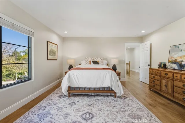 a en suite bathroom with double sink and a mirror
