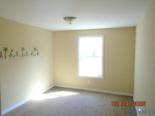 3034 Bradley Farm Road Tappahannock, VA 22560 - Photo 4 of 14 Unfurnished room with light carpet and baseboards