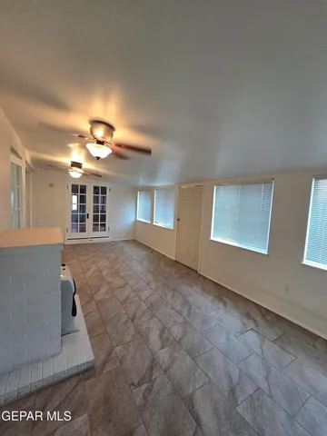 a view of a livingroom with a staircase