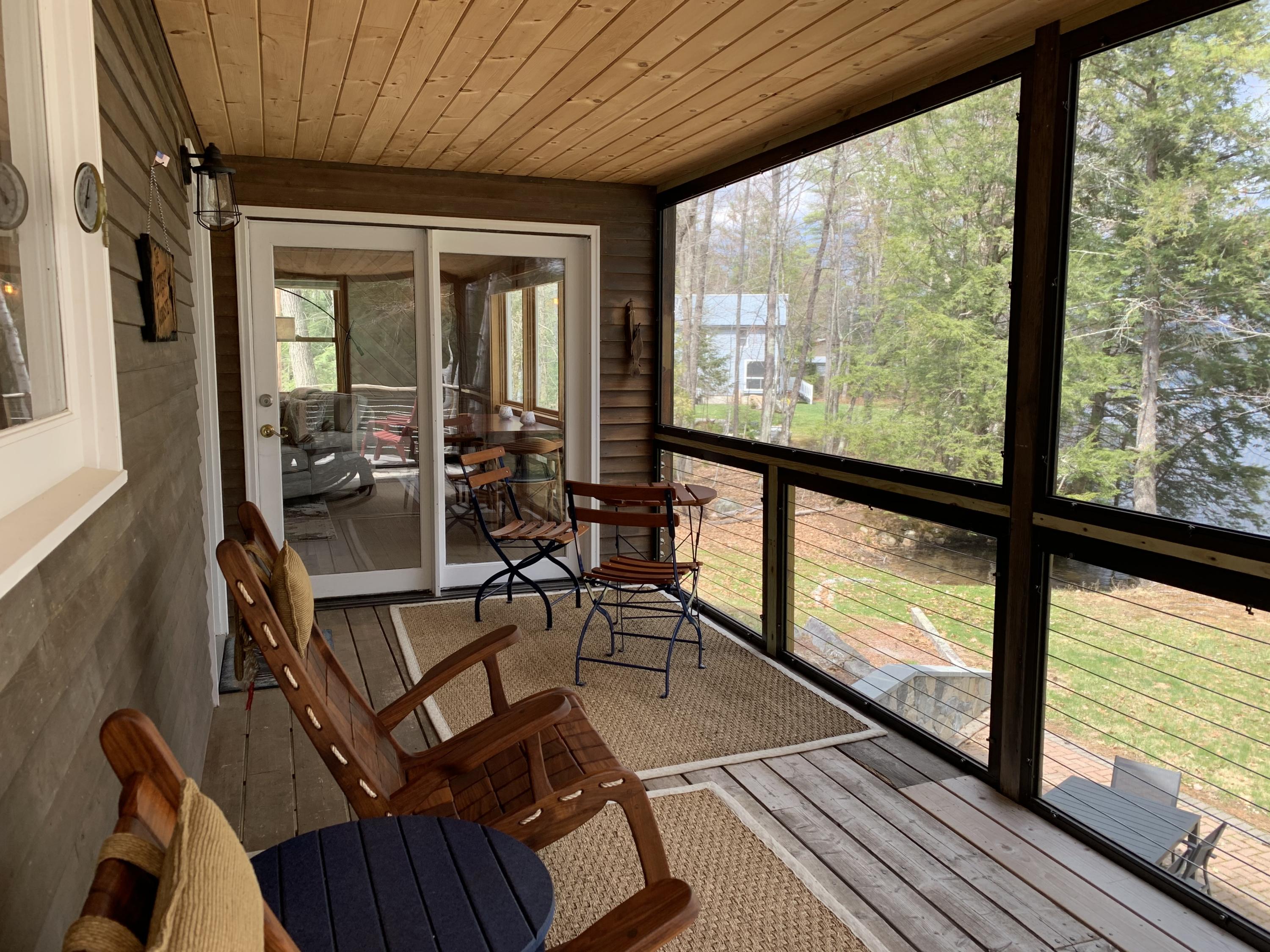 407 West Lovell Road Lovell, ME 04051 - Photo 6 of 51 Screened in porch