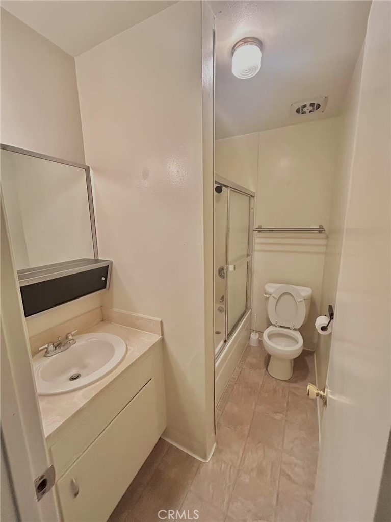 922 West Duarte Road, Unit 11 Arcadia, CA 91007 - Photo 12 of 17 a bathroom with a sink toilet and shower
