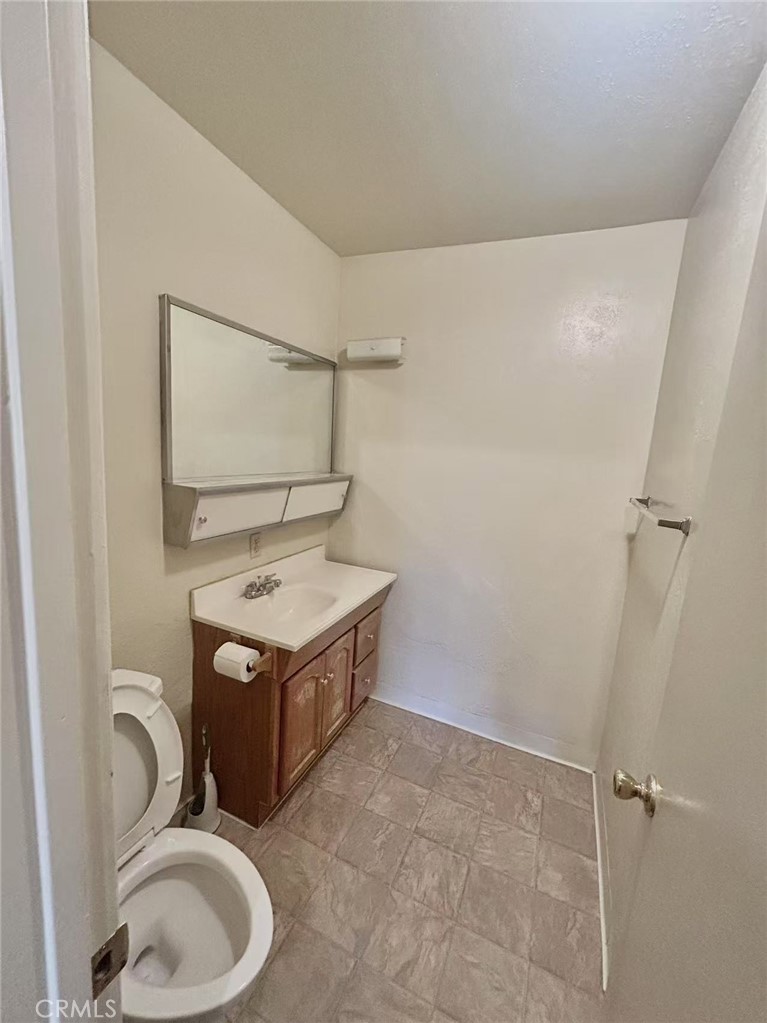 922 West Duarte Road, Unit 11 Arcadia, CA 91007 - Photo 15 of 17 a bathroom with a sink toilet and vanity