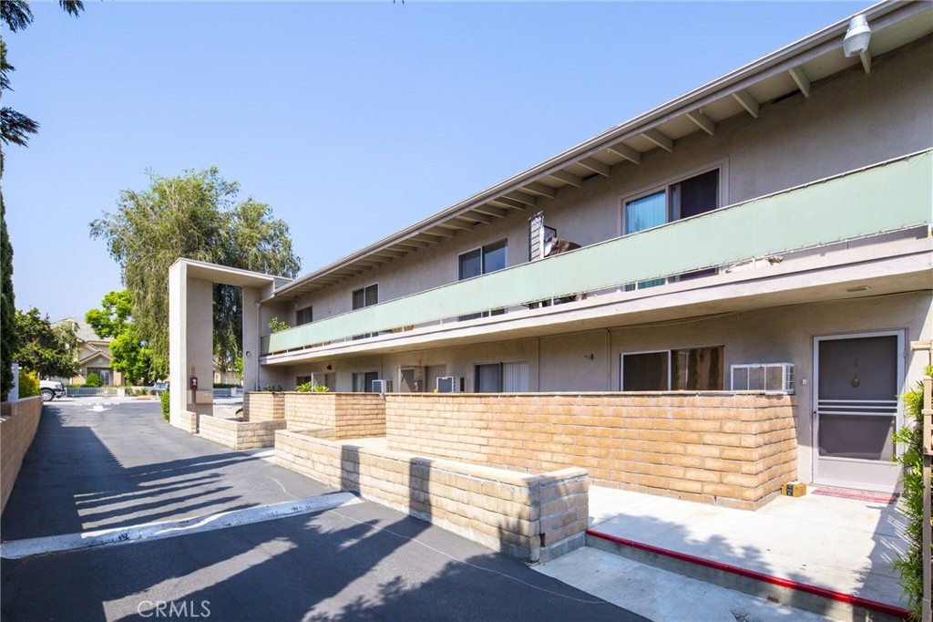 922 West Duarte Road, Unit 11 Arcadia, CA 91007 - Photo 4 of 17 a front view of house with yard