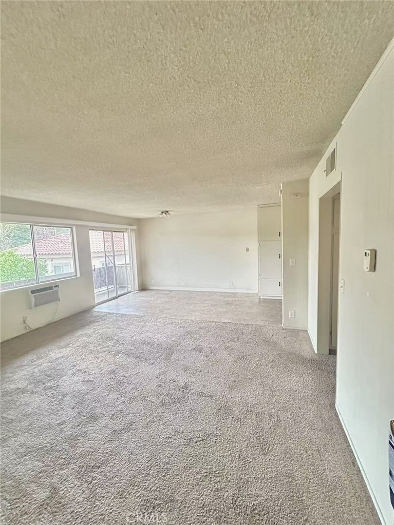922 West Duarte Road, Unit 11 Arcadia, CA 91007 - Photo 7 of 17 a view of an empty room with a window