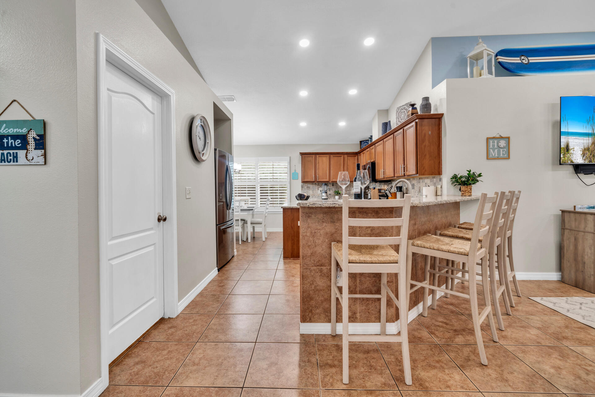 261 Sandy Cay Drive Miramar Beach, FL 32550 - Photo 13 of 72 a dining room with furniture and a kitchen view