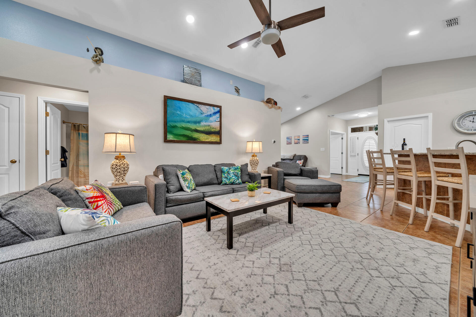 261 Sandy Cay Drive Miramar Beach, FL 32550 - Photo 26 of 72 a living room with furniture a rug and white walls
