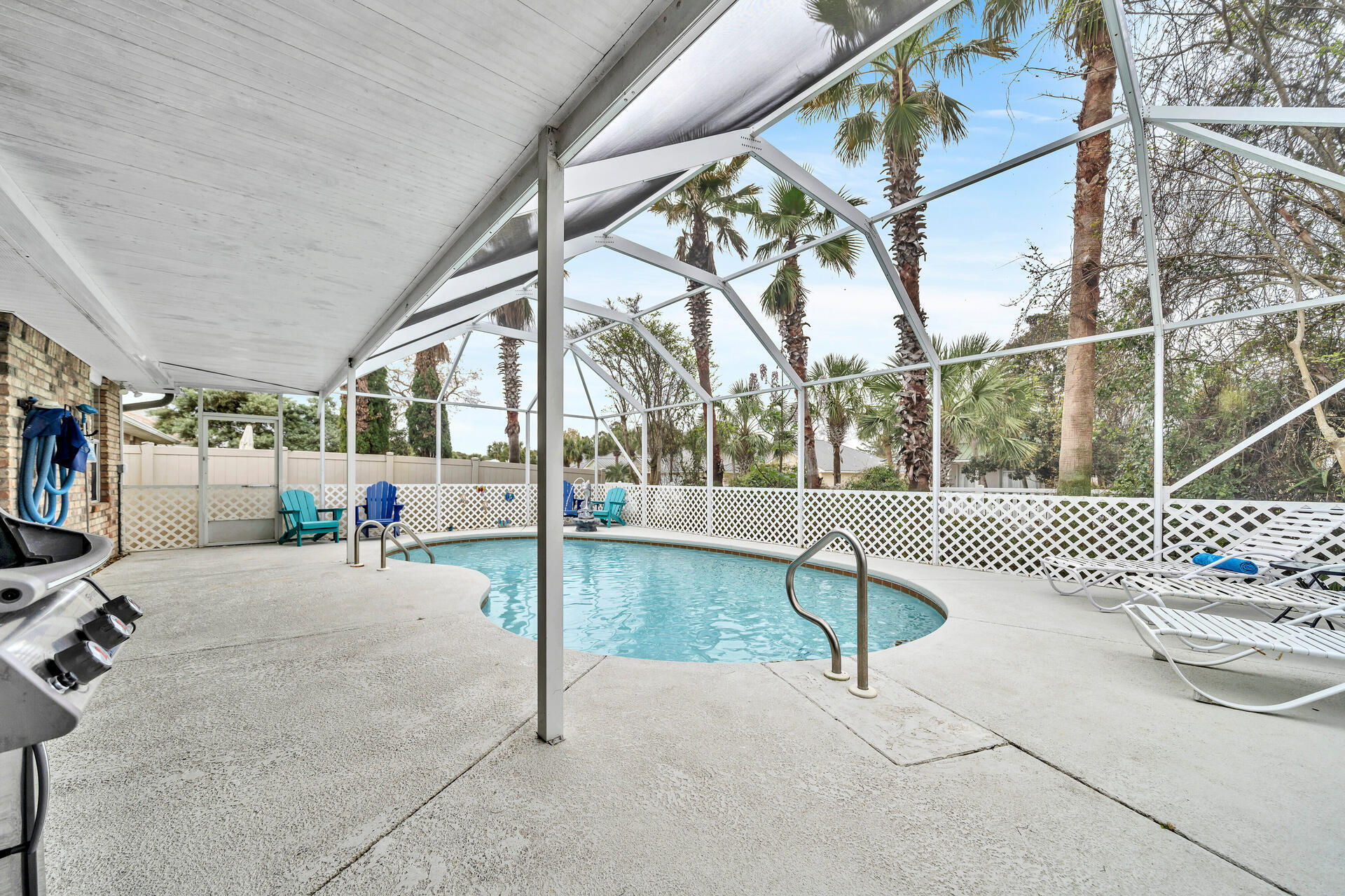 261 Sandy Cay Drive Miramar Beach, FL 32550 - Photo 50 of 72 a view of a patio with a table and chairs