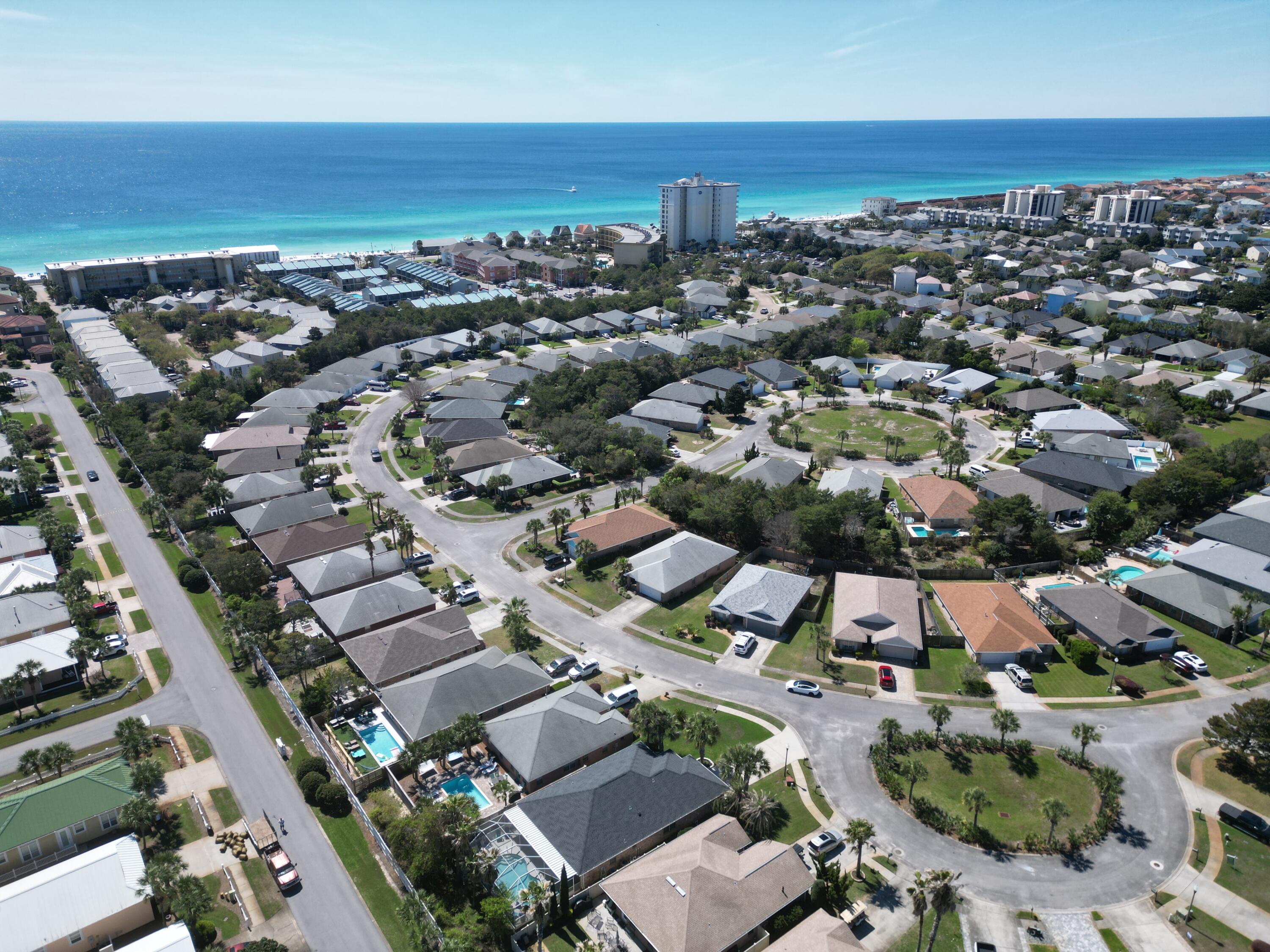 261 Sandy Cay Drive Miramar Beach, FL 32550 - Photo 66 of 72 an aerial view of a city with lots of residential buildings and ocean view in back