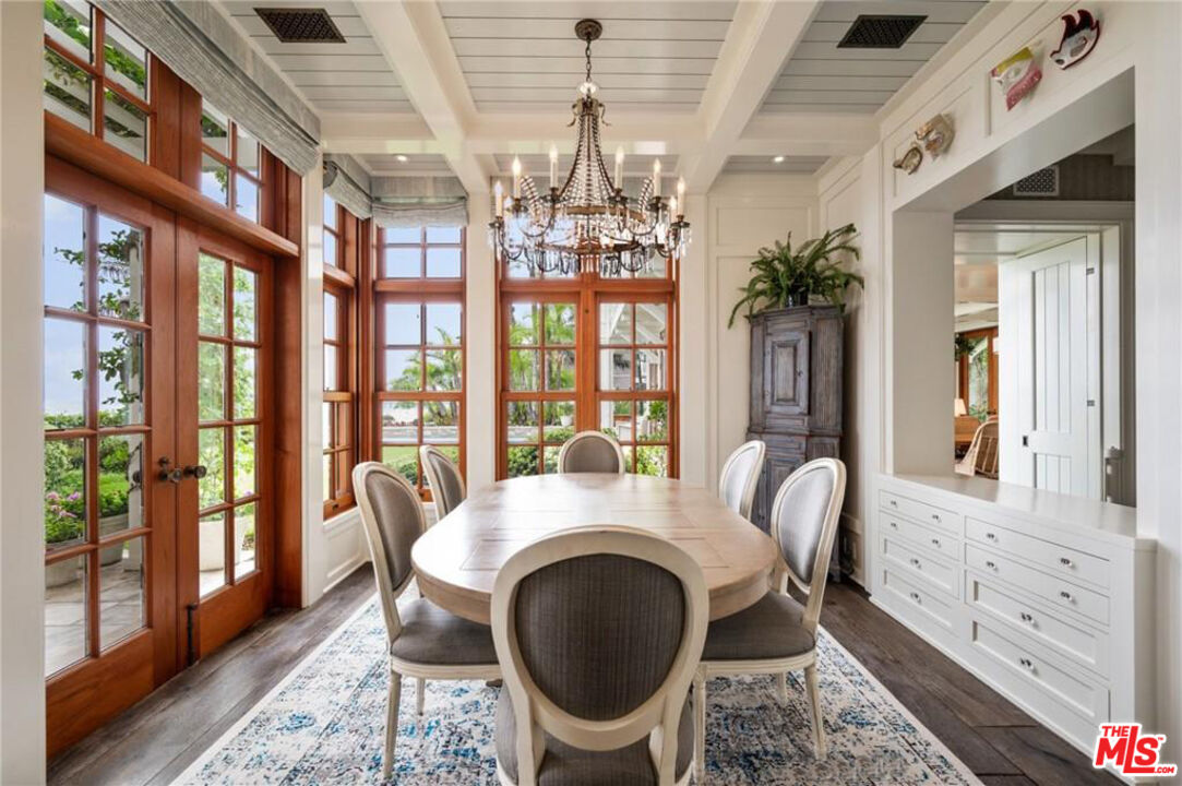 212 The Strand Manhattan Beach, CA 90266 - Photo 24 of 74 a very nice looking dining room with a large window and dining table