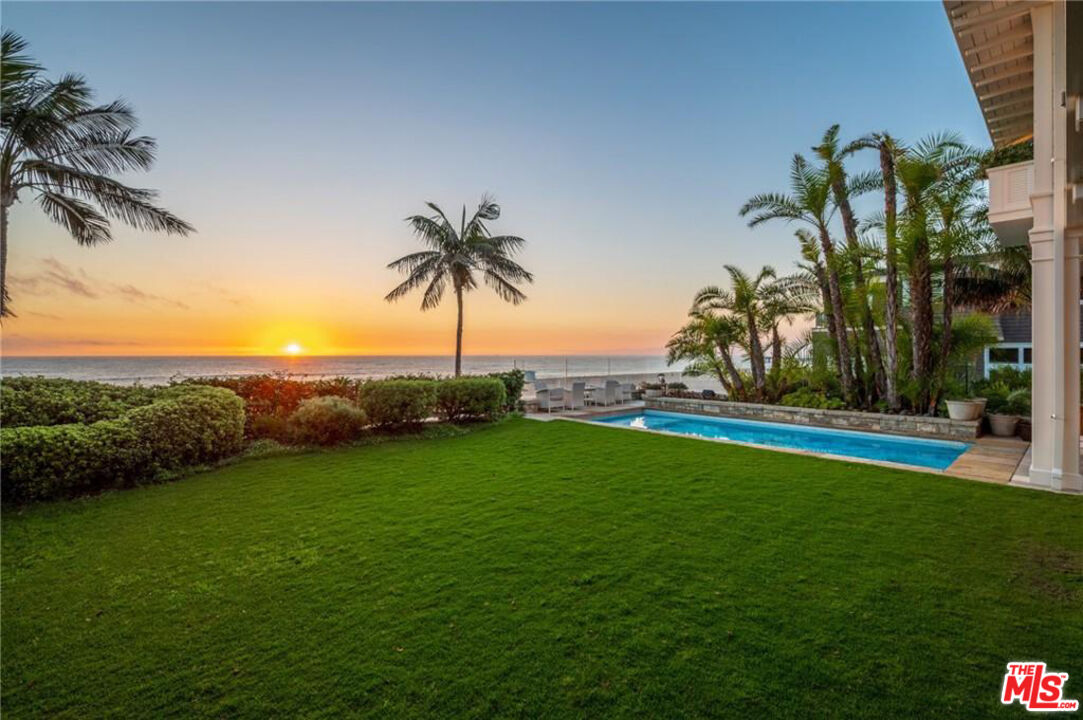 212 The Strand Manhattan Beach, CA 90266 - Photo 28 of 74 a view of a yard and palm trees