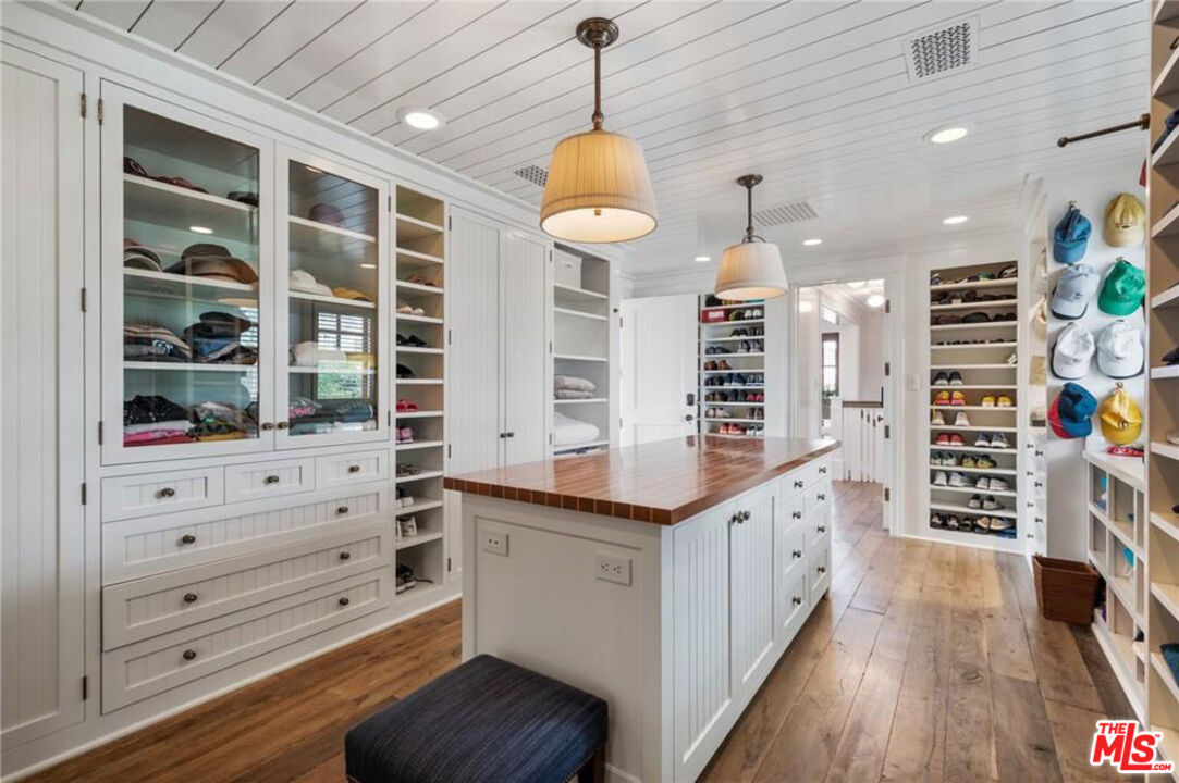 212 The Strand Manhattan Beach, CA 90266 - Photo 42 of 74 a kitchen with stainless steel appliances a stove and cabinets