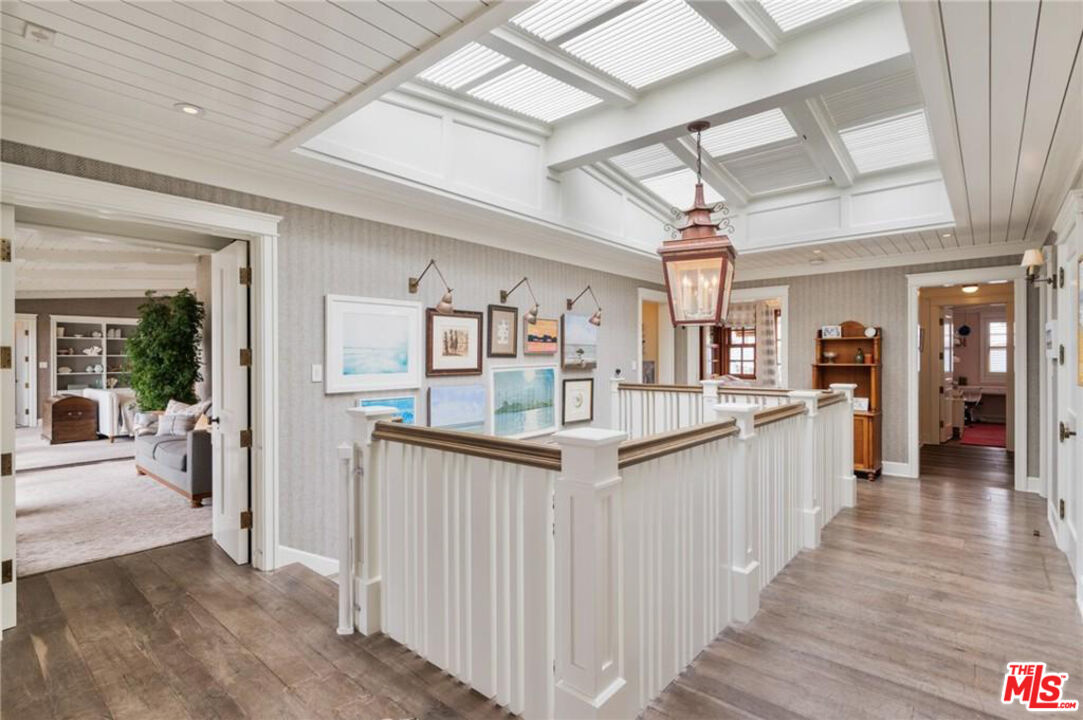 212 The Strand Manhattan Beach, CA 90266 - Photo 50 of 74 a kitchen with granite countertop counter top space and wooden floor