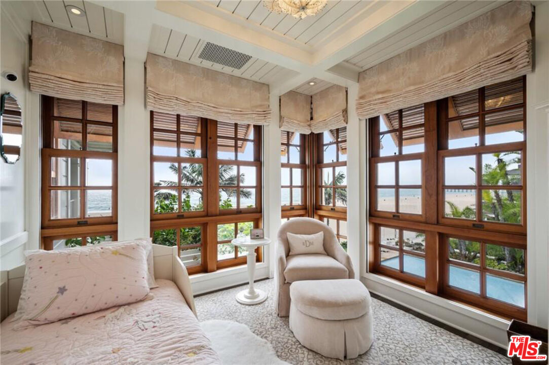 212 The Strand Manhattan Beach, CA 90266 - Photo 51 of 74 a living room with furniture and a large window