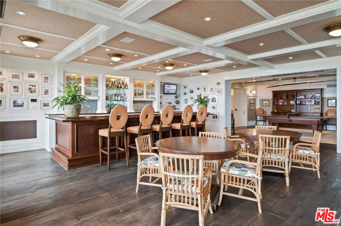 212 The Strand Manhattan Beach, CA 90266 - Photo 57 of 74 a view of a dining room with furniture window and wooden floor
