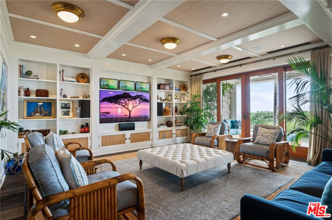 212 The Strand Manhattan Beach, CA 90266 - Photo 58 of 74 a living room with furniture and a flat screen tv