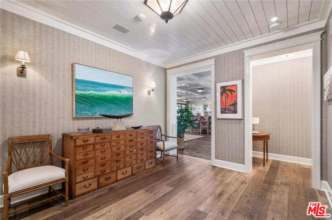 212 The Strand Manhattan Beach, CA 90266 - Photo 65 of 74 a living room with furniture and a flat screen tv