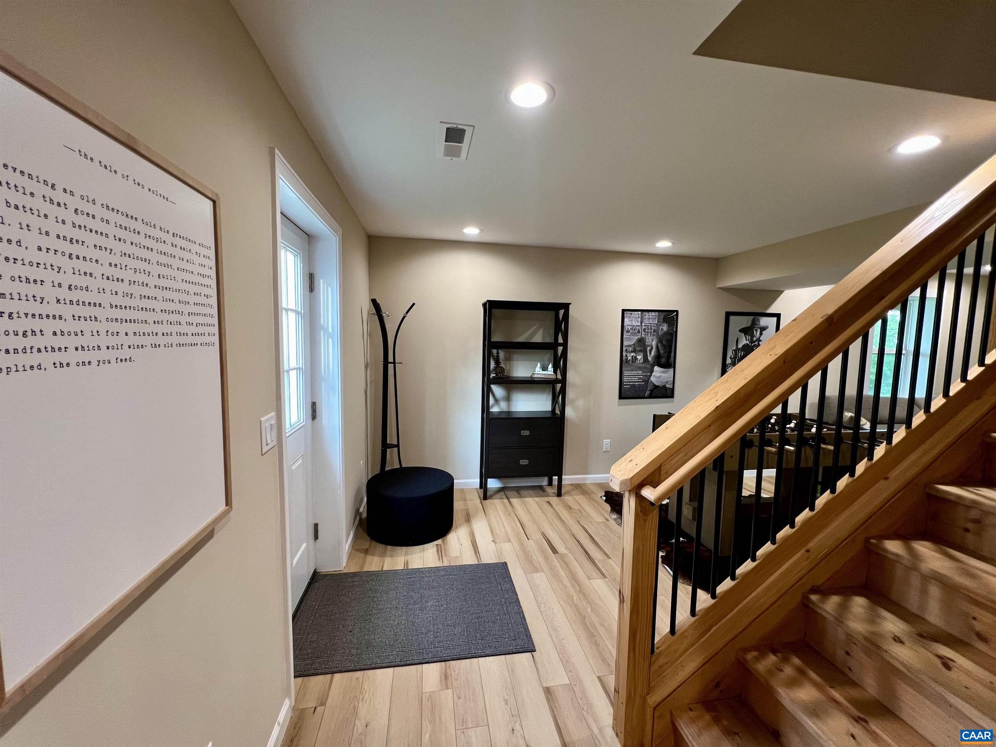 248 Raven Way Free Union, VA 22940 - Photo 25 of 47 a view of entryway and hall with wooden floor