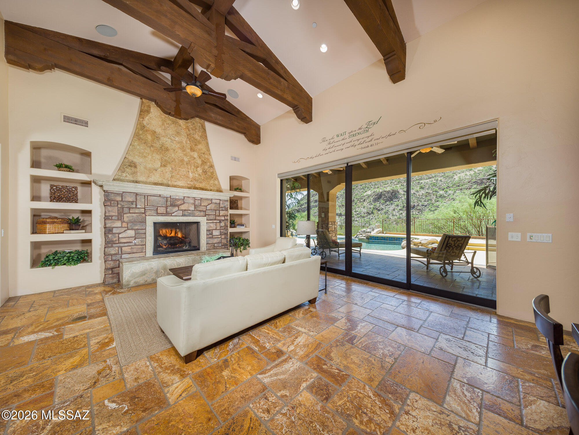 14225 North Rocking Ridge Court Marana, AZ 85658 - Photo 7 of 51 Formal living with fireplace and a wall of windows