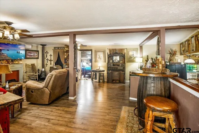 a living room with furniture and a table