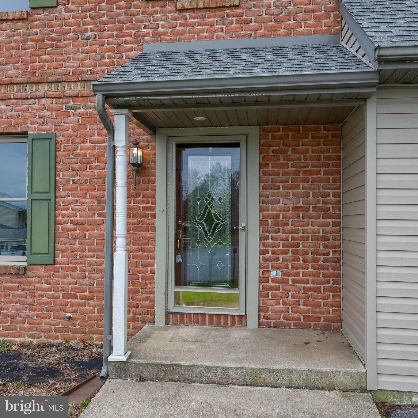1001 Rebecca Drive Lititz, PA 17543 - Photo 3 of 49 Charming entryway with brick accents.