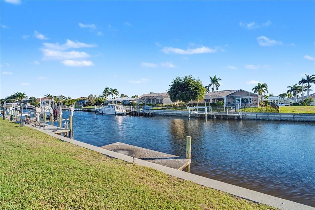 1119 Vía Formia Punta Gorda, FL 33950 - Photo 11 of 58 a view of a lake with houses