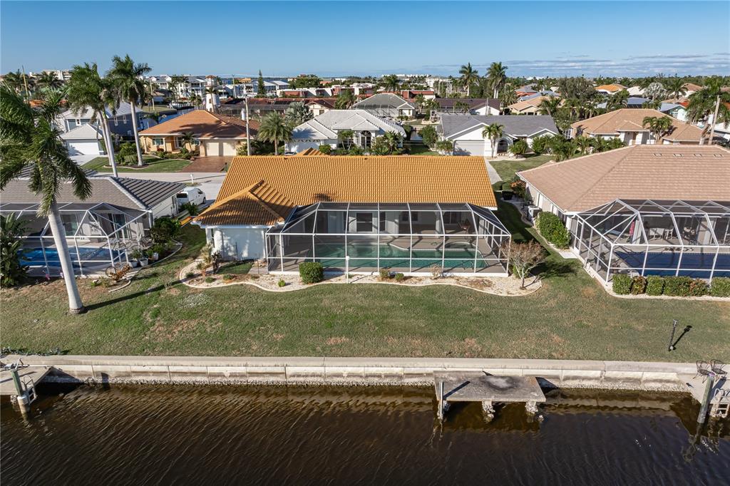 1119 Vía Formia Punta Gorda, FL 33950 - Photo 12 of 58 an aerial view of a house