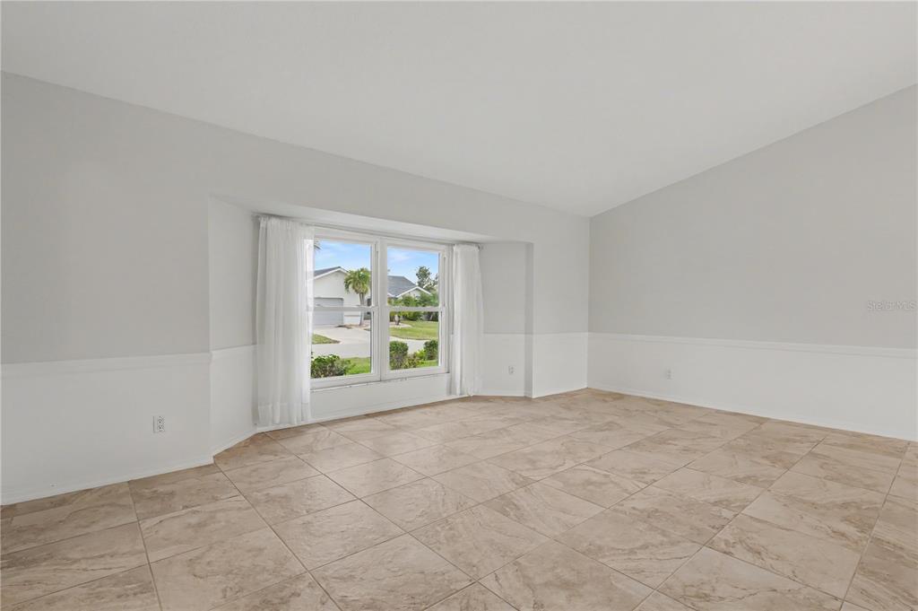 1119 Vía Formia Punta Gorda, FL 33950 - Photo 20 of 58 an empty room with windows