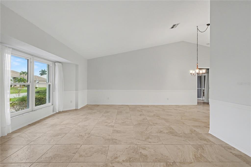 1119 Vía Formia Punta Gorda, FL 33950 - Photo 21 of 58 a view of an empty room with a window