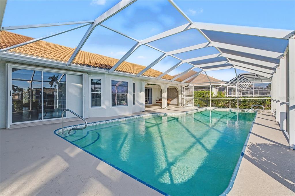 1119 Vía Formia Punta Gorda, FL 33950 - Photo 47 of 58 a view of a house with a backyard