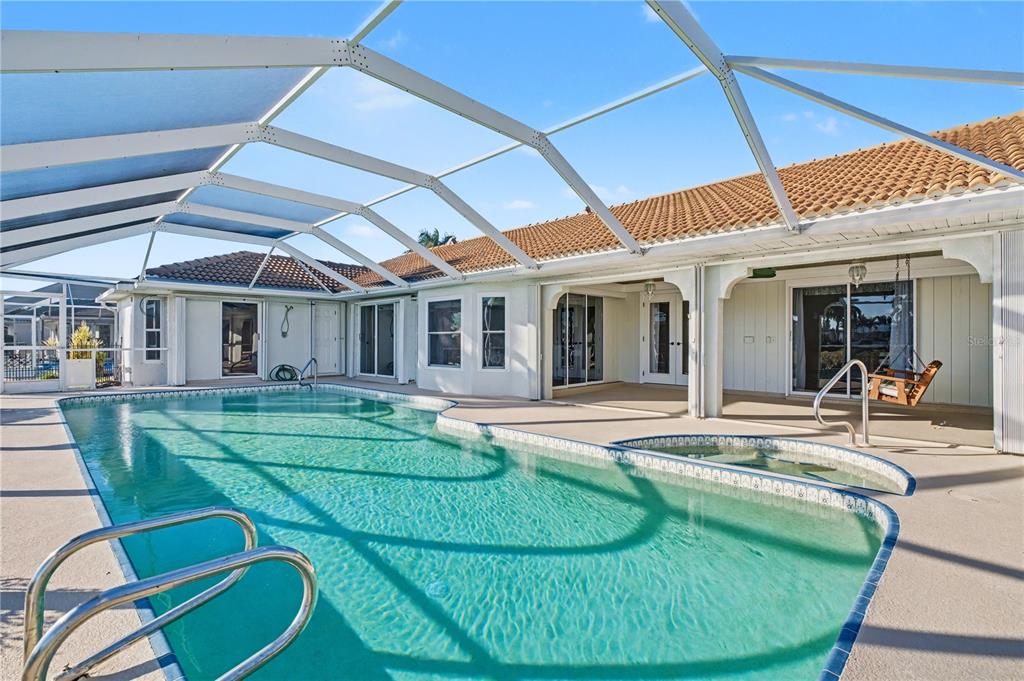 1119 Vía Formia Punta Gorda, FL 33950 - Photo 48 of 58 a view of a house with swimming pool