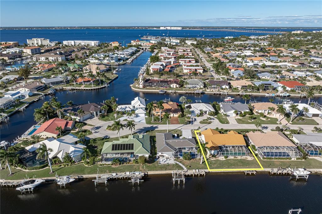 1119 Vía Formia Punta Gorda, FL 33950 - Photo 53 of 58 an aerial view of residential houses with outdoor space