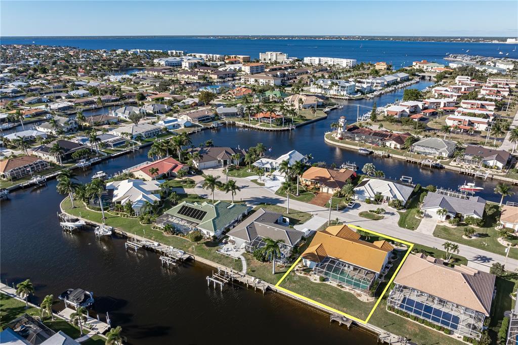 1119 Vía Formia Punta Gorda, FL 33950 - Photo 54 of 58 an aerial view of residential houses with outdoor space
