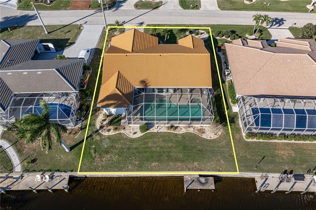 1119 Vía Formia Punta Gorda, FL 33950 - Photo 56 of 58 an aerial view of a house with a yard