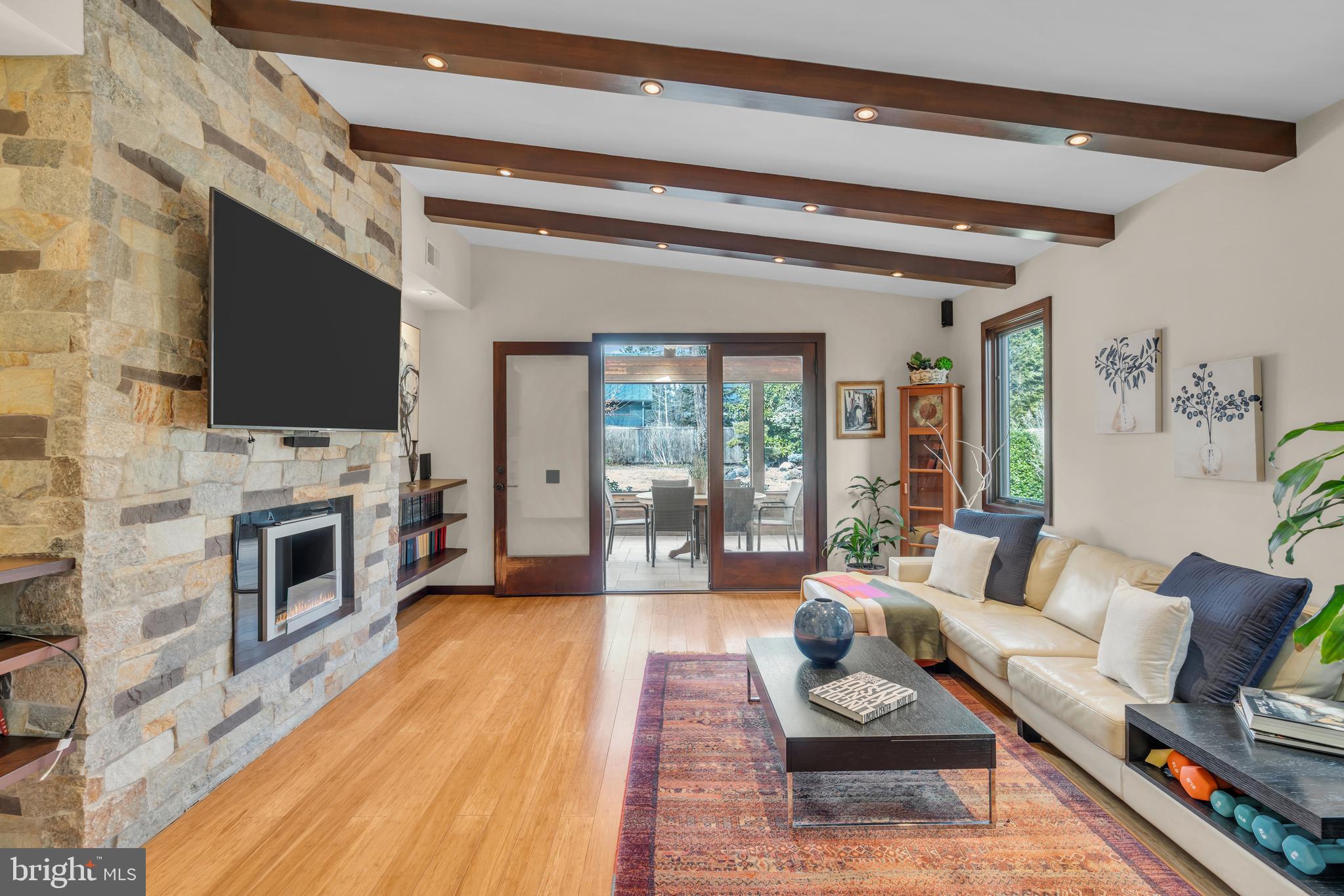 152 Terhune Road Princeton, NJ 08540 - Photo 5 of 42 a living room with fireplace furniture and a flat screen tv
