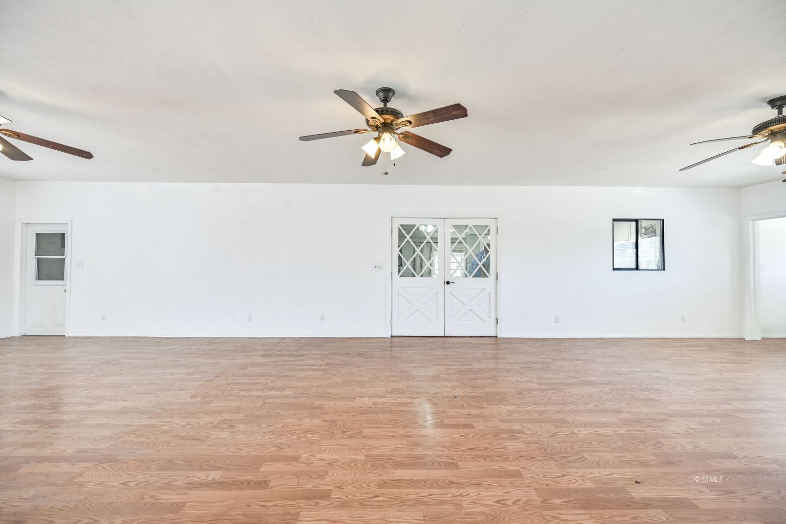 1407 North Indian Wells Street Ridgecrest, CA 93555 - Photo 25 of 50 a view of a room with a painting on the wall