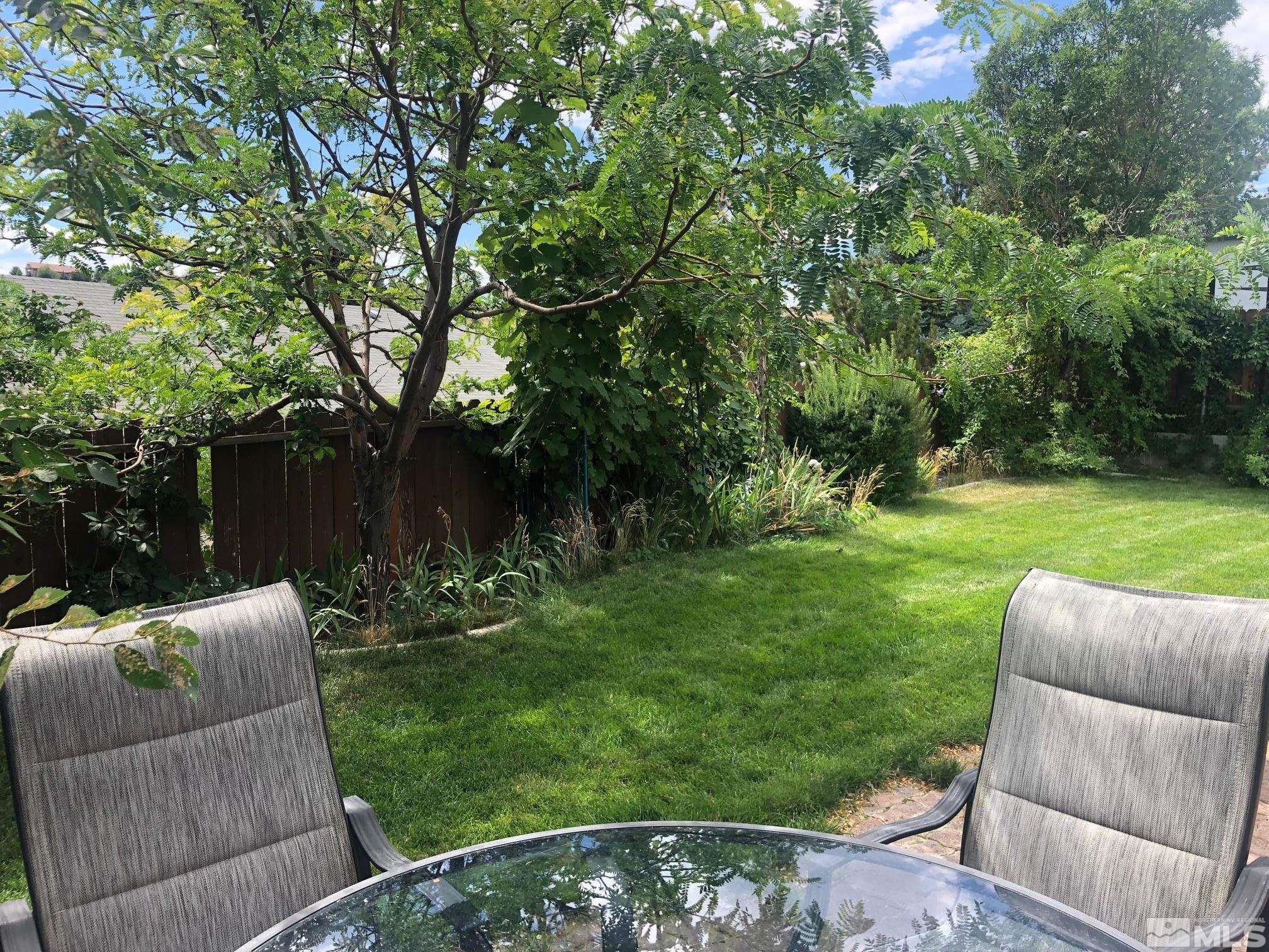 1401 Sandia Court Reno, NV 89523 - Photo 12 of 13 a view of backyard with seating area and green space