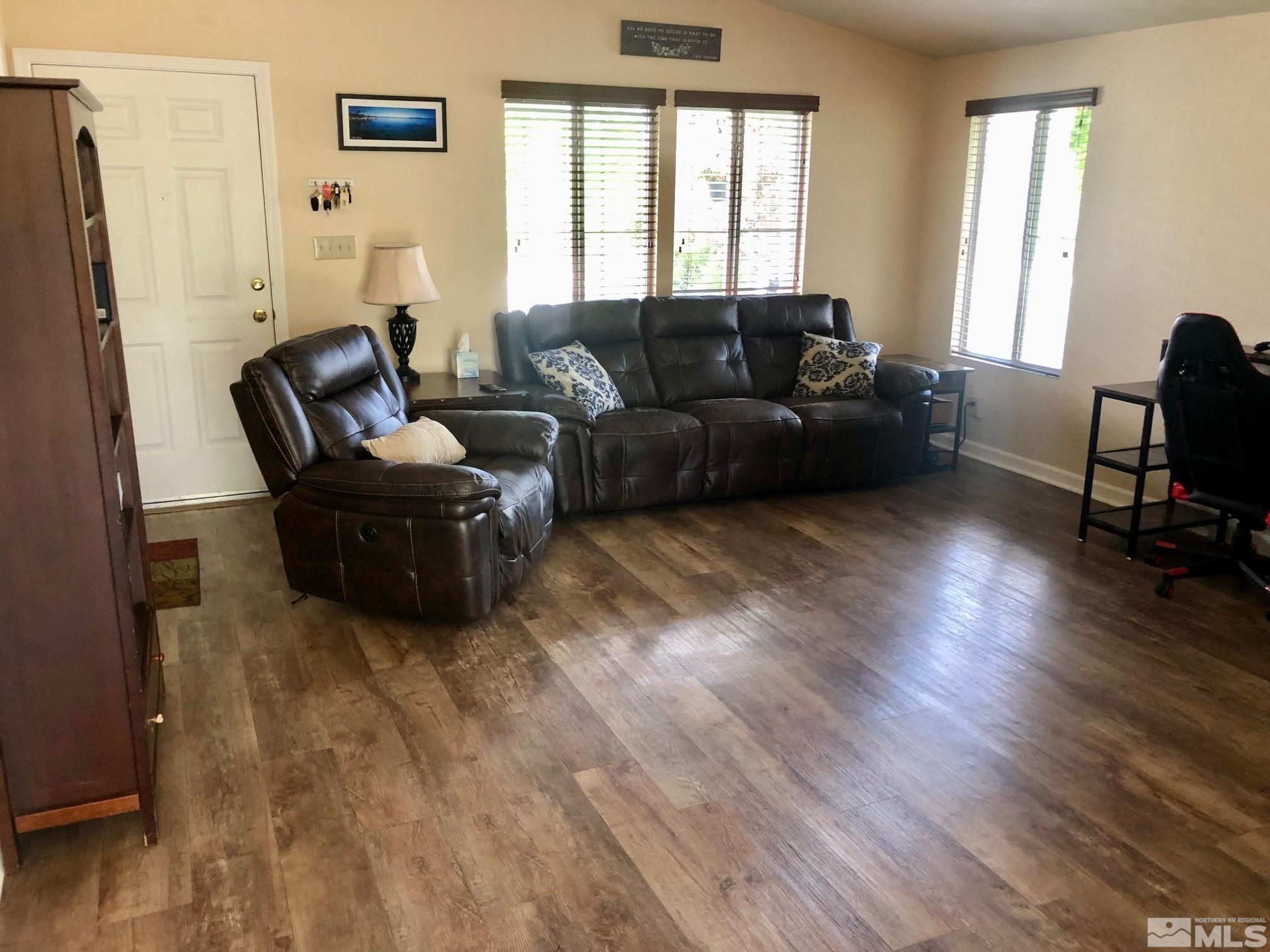 1401 Sandia Court Reno, NV 89523 - Photo 4 of 13 a living room with furniture window and a wooden floor