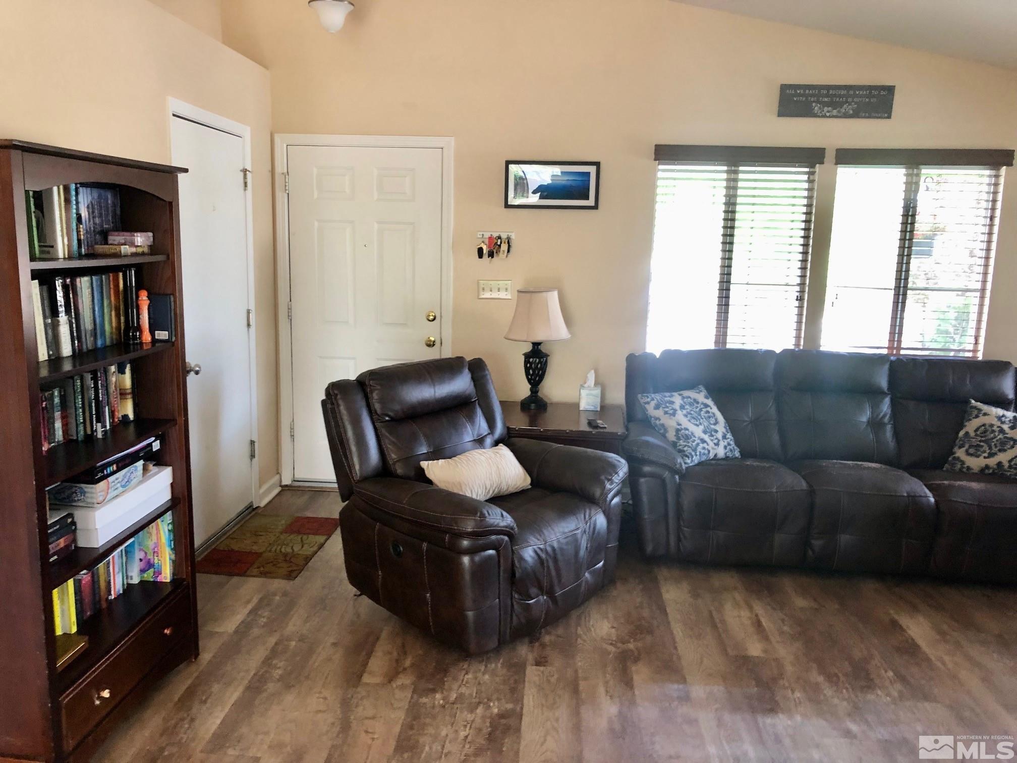 1401 Sandia Court Reno, NV 89523 - Photo 5 of 13 a living room with furniture and a book shelf