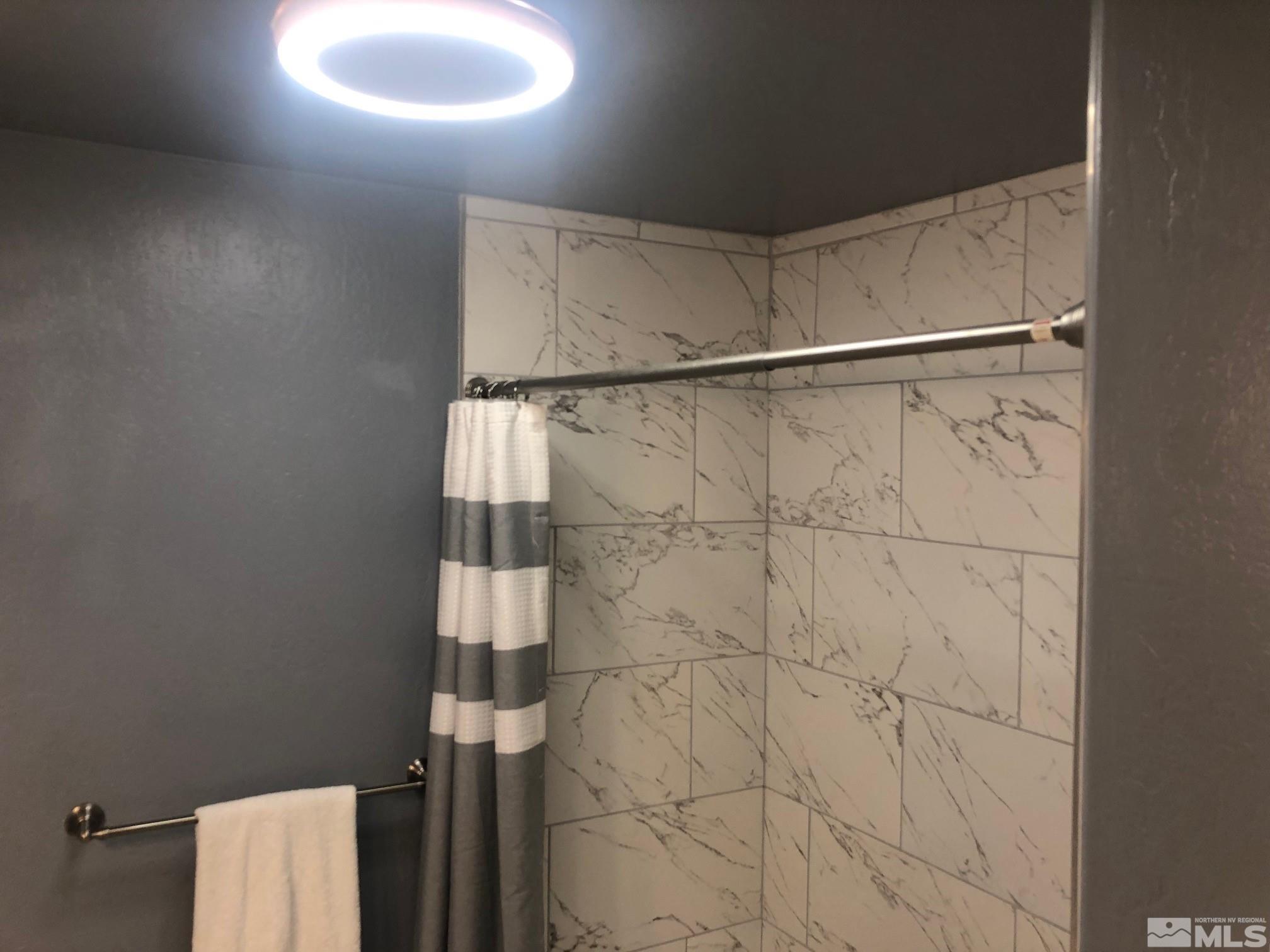 1401 Sandia Court Reno, NV 89523 - Photo 9 of 13 a bathroom with a shower