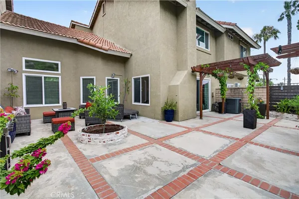 a backyard of a house with seating space
