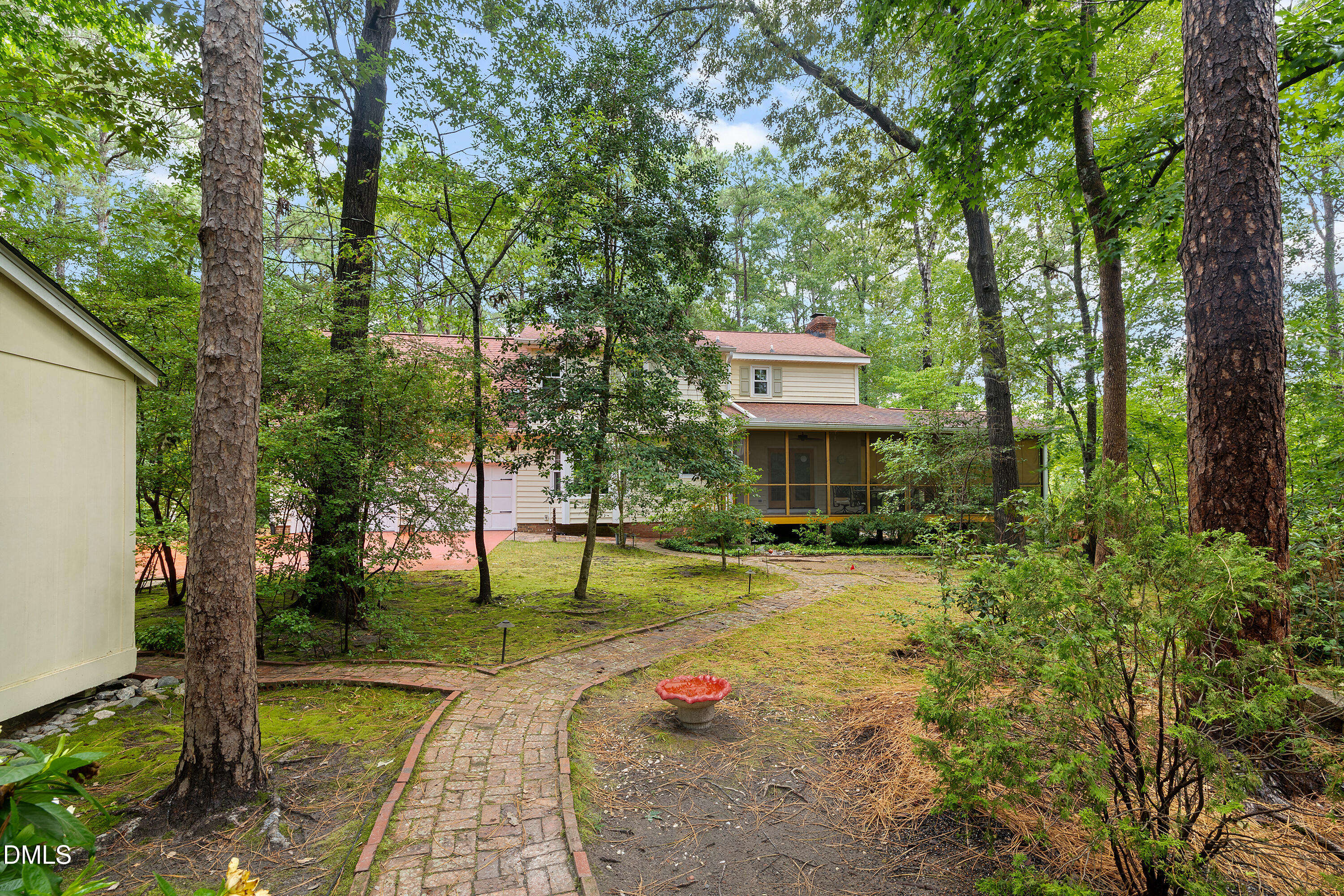 5216 Bridget Drive Raleigh, NC 27603 - Photo 30 of 30 a pathway of a house with a yard