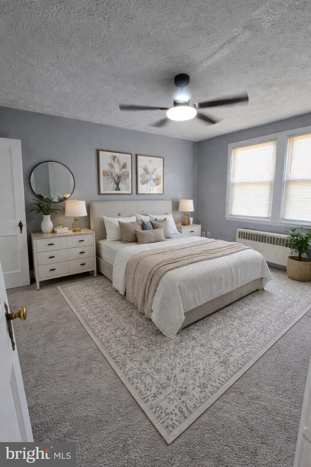6105 Frederick Road Catonsville, MD 21228 - Photo 22 of 38 a bedroom with bed and window