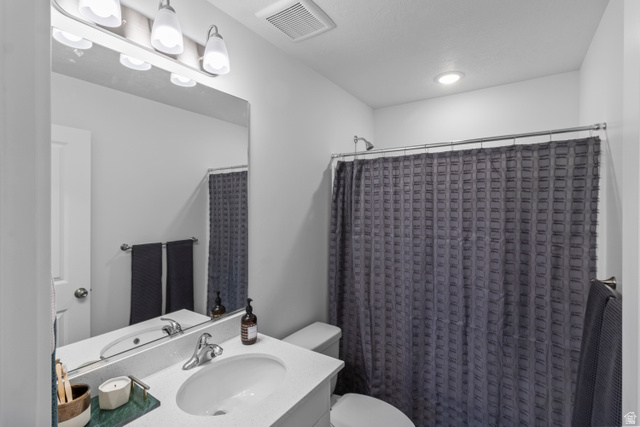 3003 South 265th Street West, Unit 751 Logan, UT 84321 - Photo 19 of 29 Full bath featuring vanity and a shower with shower curtain