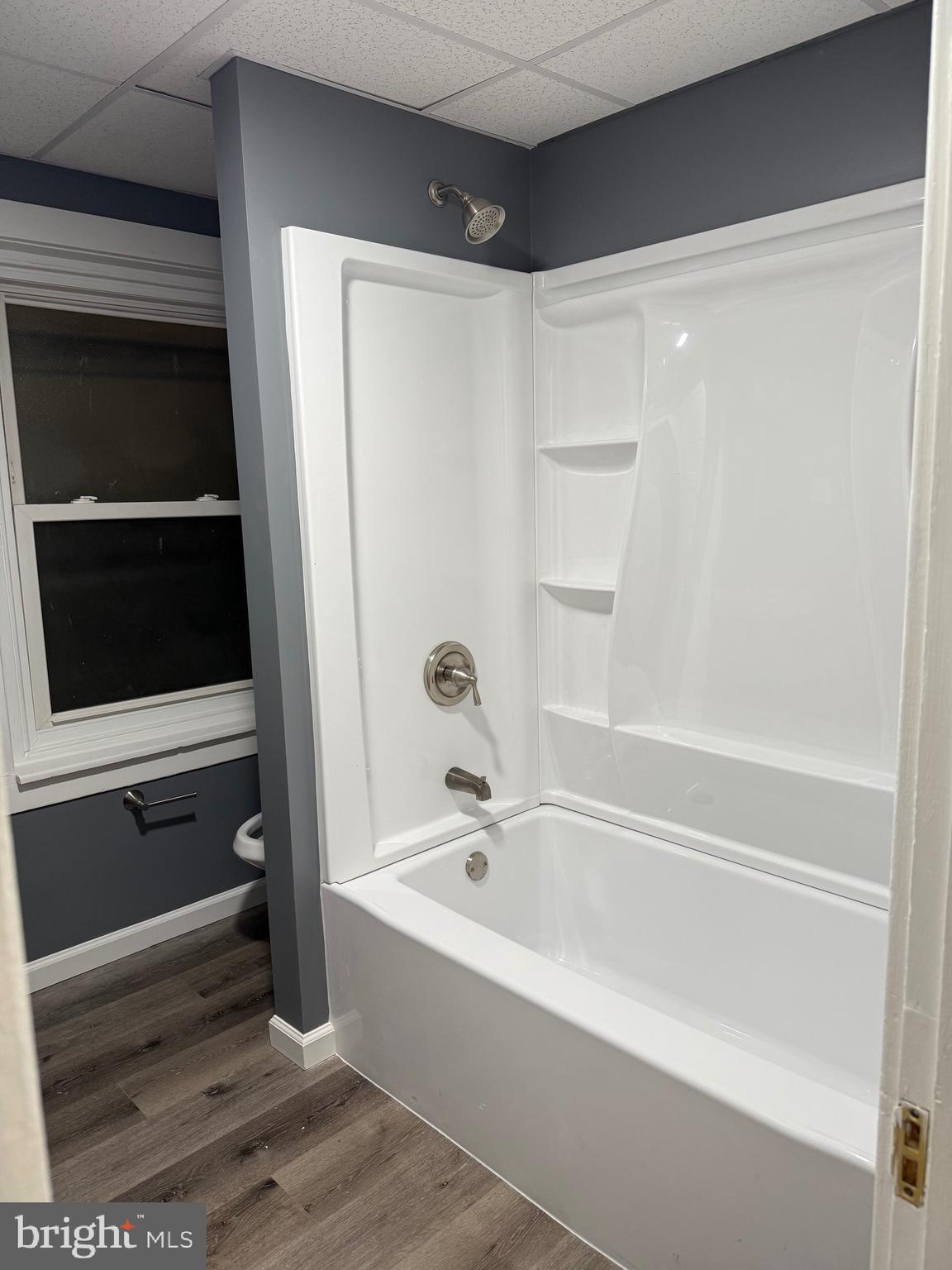 399 Sunset Road Reading, PA 19611 - Photo 9 of 18 a bathroom with a bathtub and a shower