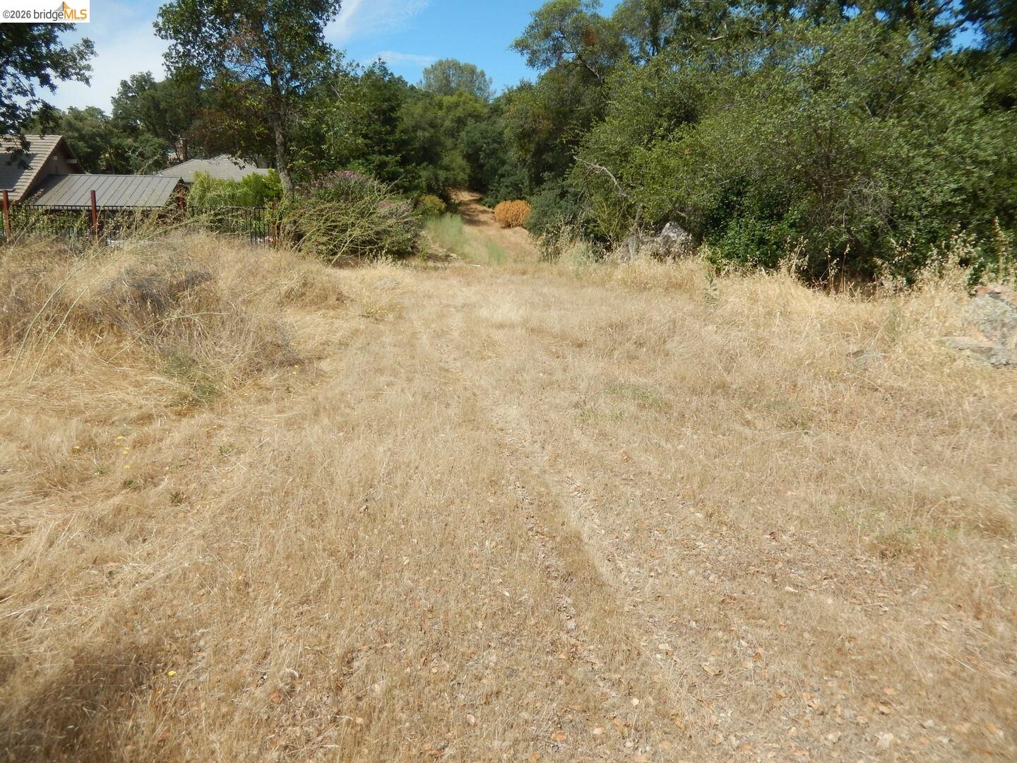 512 Crazy Horse Road Cameron Park, CA 95682 - Photo 14 of 18 a view of a snow in a yard