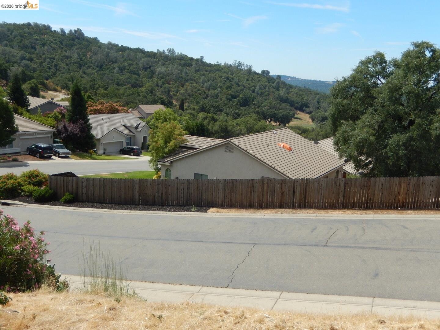 512 Crazy Horse Road Cameron Park, CA 95682 - Photo 8 of 18 a view of a backyard